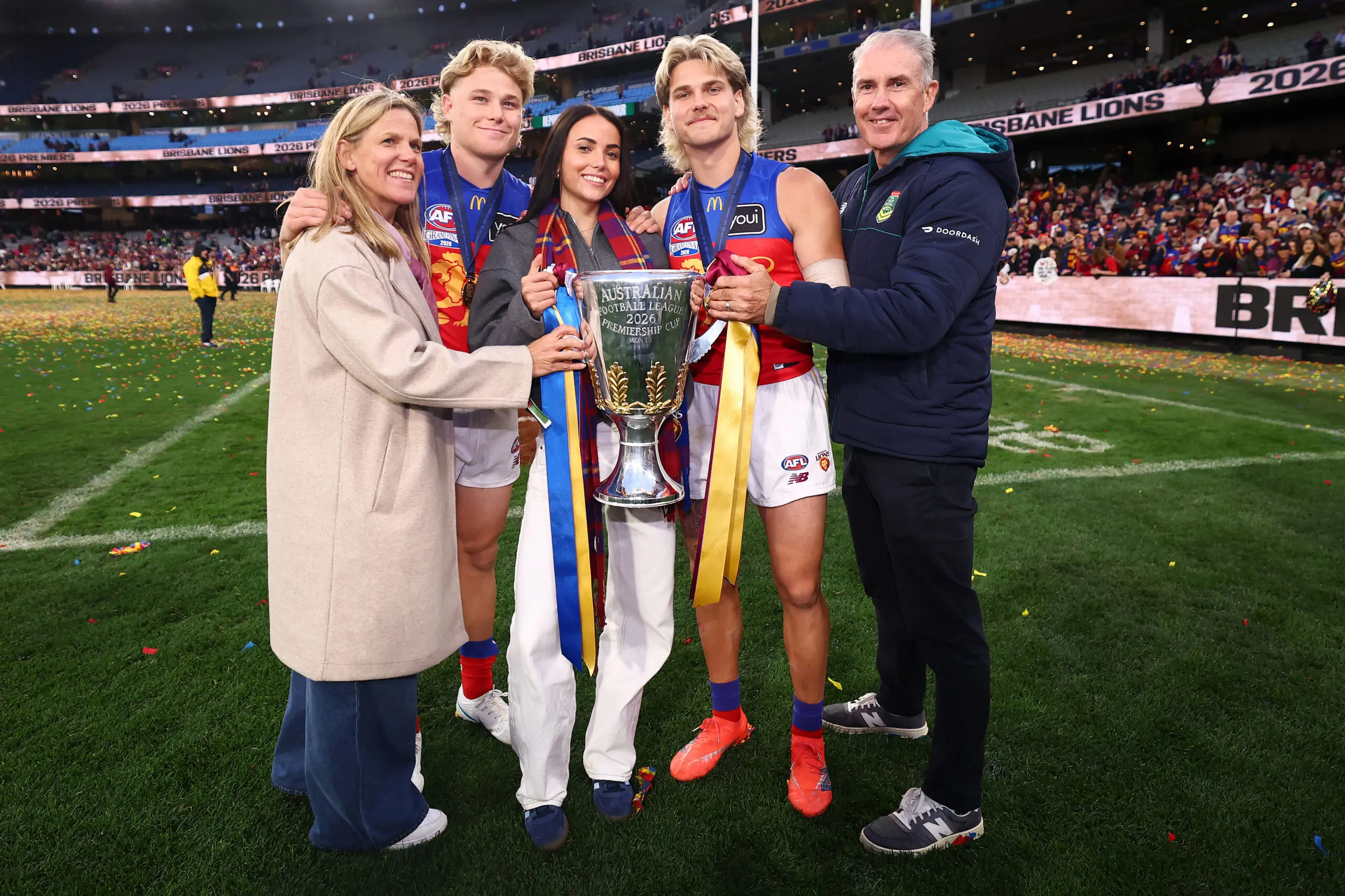 MELBOURNE, AUSTRALIA - SEPTEMBER 26: Levi Ashcroft and Will Ashcroft of the Lions pose for a photograph with their family and the Premiership Cup after the AFL Grand Final match between Fremantle Dockers and Brisbane Lions at Melbourne Cricket Ground, on September 26, 2026, in Melbourne, Australia. (Photo by Daniel Pockett/AFL Photos/via Getty Images)