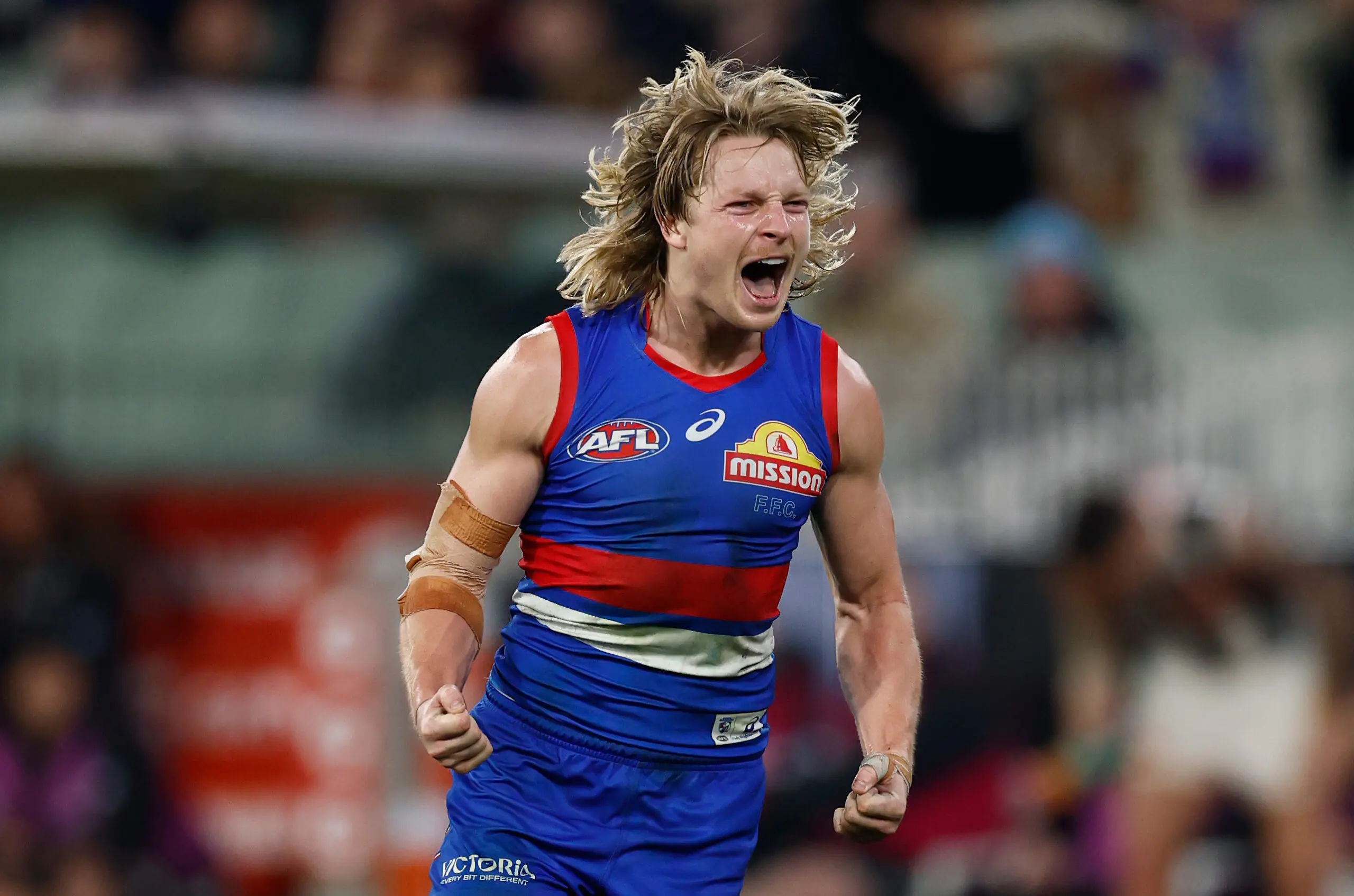 MELBOURNE, AUSTRALIA - AUGUST 28: Cody Weightman of the Bulldogs celebrates a goal during the 2026 AFL Second Wildcard Final between the Western Bulldogs and the Collingwood Magpies at the Melbourne Cricket Ground on August 28, 2026 in Melbourne, Australia. (Photo by Michael Willson/AFL Photos via Getty Images)