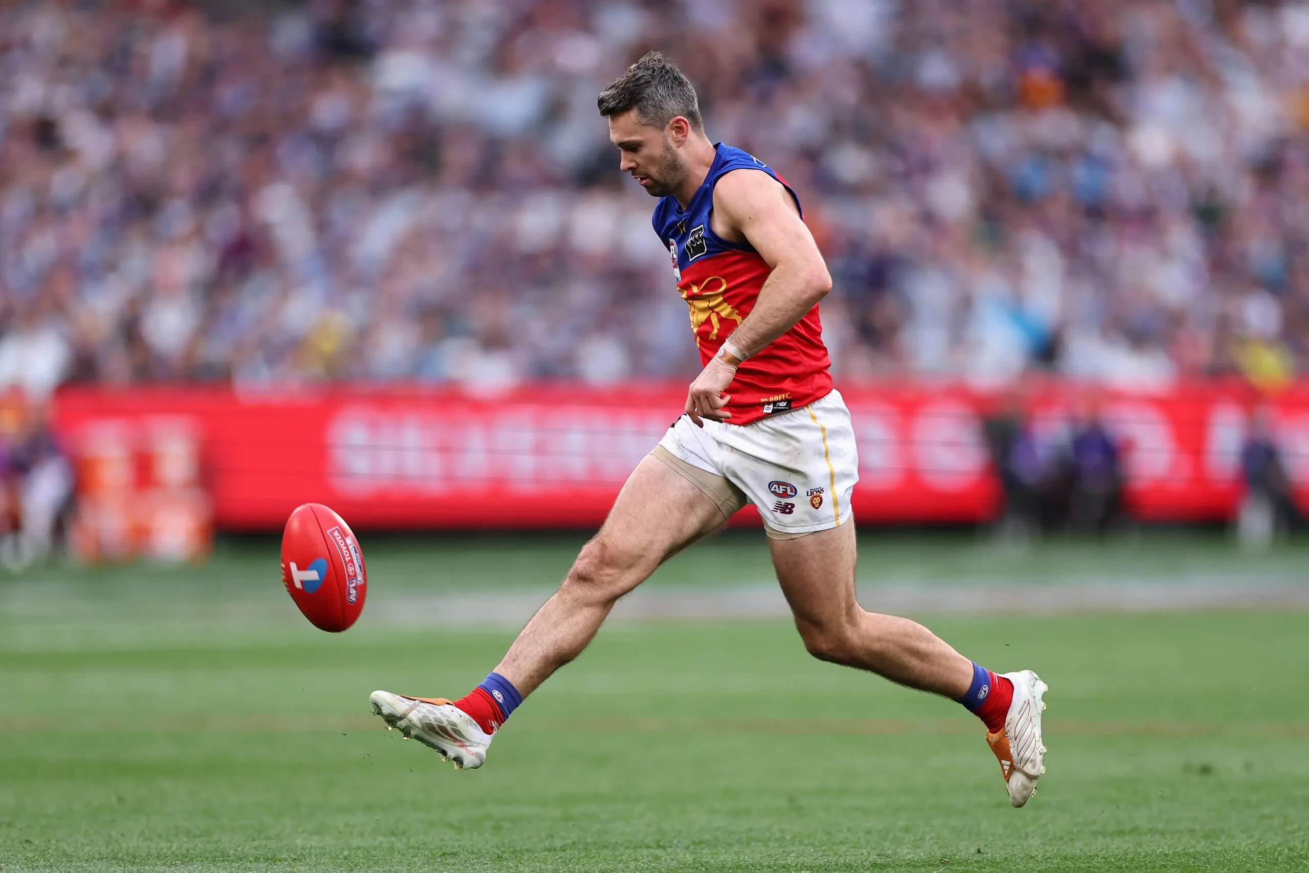 MELBOURNE, AUSTRALIA - SEPTEMBER 26: Conor McKenna of the Lions kicks during the AFL Grand Final match between Fremantle Dockers and Brisbane Lions at Melbourne Cricket Ground, on September 26, 2026, in Melbourne, Australia. (Photo by Cameron Spencer/AFL Photos/via Getty Images)