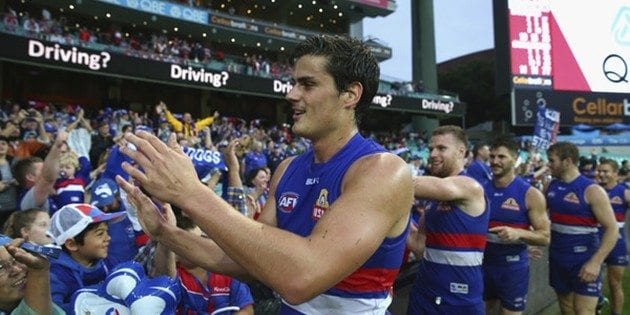 Tom Boyd celebrates with fans after the Bulldogs win over Sydney at the SCG. Picture: Ryan Pierse/Getty Images AsiaPac.