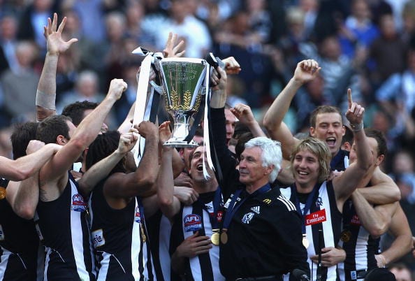 MELBOURNE, AUSTRALIA - OCTOBER 02:  The  Magpies hold up the Premiership Cup after the Magpies won the AFL Grand Final Replay match between the Collingwood Magpies and the St Kilda Saints at Melbourne Cricket Ground on October 2, 2010 in Melbourne, Australia.  (Photo by Quinn Rooney/Getty Images)