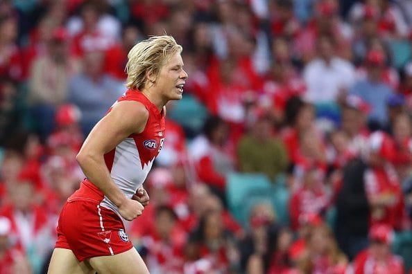 SYDNEY, AUSTRALIA - MAY 07: Isaac Heeney of the Swans celebrates kicking a goal during the round seven AFL match between the Sydney Swans and the Essendon Bombers at Sydney Cricket Ground on May 7, 2016 in Sydney, Australia. (Photo by Cameron Spencer/Getty Images)
