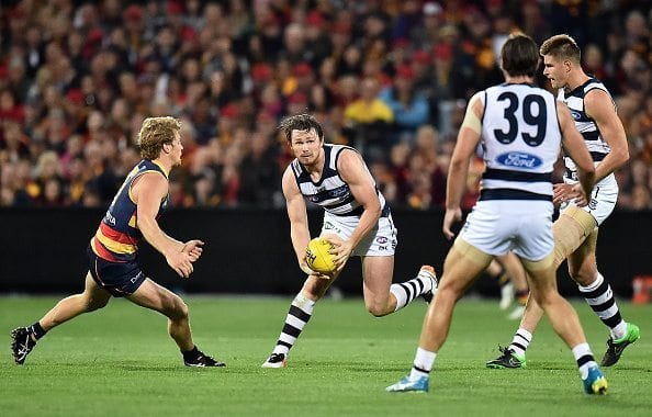 ADELAIDE, AUSTRALIA - MAY 13: Patrick Dangerfield of the Cats looks to pass the ball during the round eight AFL match between the Adelaide Crows and the Geelong Cats at Adelaide Oval on May 13, 2016 in Adelaide, Australia.  (Photo by Daniel Kalisz/Getty Images)