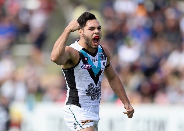 ALICE SPRINGS, AUSTRALIA - MAY 28: Jarman Impey of Port Adelaide celebrates after scoring a goal during the round 10 AFL match between the Melbourne Demons and the Port Adelaide Power at Traeger Park on May 28, 2016 in Alice Springs, Australia. (Photo by Robert Cianflone/Getty Images)