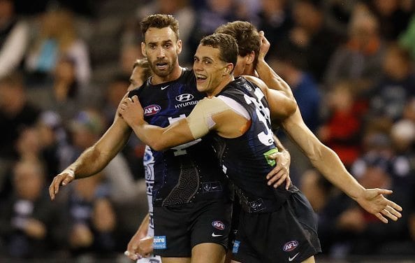 MELBOURNE, AUSTRALIA - MAY 29: Andrew Walker (left) and Ed Curnow of the Blues celebrate during the 2016 AFL Round 10 match between the Carlton Blues and the Geelong Cats at Etihad Stadium on May 29, 2016 in Melbourne, Australia. (Photo by Michael Willson/AFL Media/Getty Images)