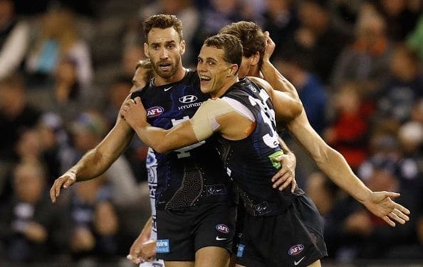 MELBOURNE, AUSTRALIA - MAY 29: Andrew Walker (left) and Ed Curnow of the Blues celebrate during the 2016 AFL Round 10 match between the Carlton Blues and the Geelong Cats at Etihad Stadium on May 29, 2016 in Melbourne, Australia. (Photo by Michael Willson/AFL Media/Getty Images)