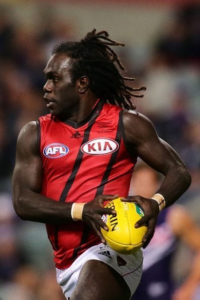 PERTH, WESTERN AUSTRALIA - JUNE 04: Anthony McDonald-Tipungwuti of the Bombers looks to pass the ball during the round 11 AFL match between the Fremantle Dockers and the Essendon Bombers at Domain Stadium on June 4, 2016 in Perth, Australia. (Photo by Will Russell/AFL Media/Getty Images)