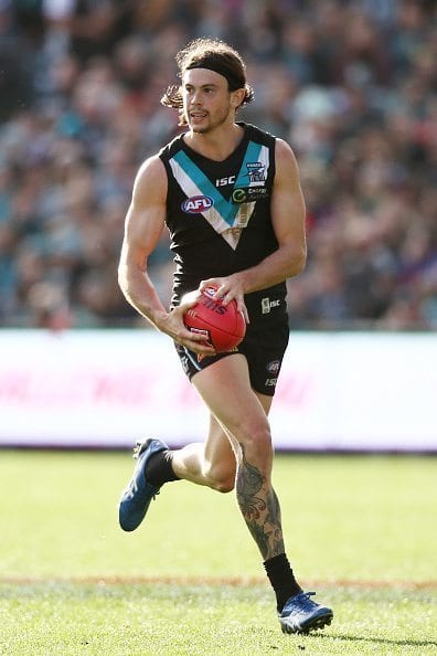 ADELAIDE, AUSTRALIA - JUNE 11: Jasper Pittard of the Power runs with the ball during the round 12 AFL match between the Port Adelaide Power and the Western Bulldogs at Adelaide Oval on June 11, 2016 in Adelaide, Australia. (Photo by Morne de Klerk/Getty Images)