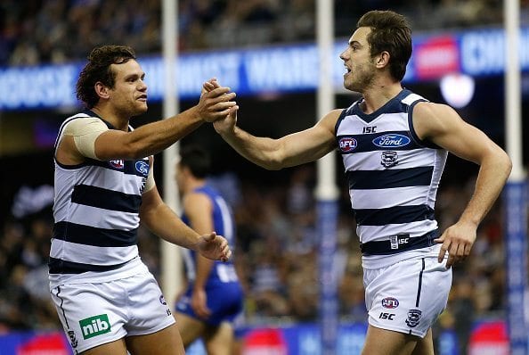 MELBOURNE, AUSTRALIA - JUNE 11: Steven Motlop (left) and Daniel Menzel of the Cats celebrate during the 2016 AFL Round 12 match between the Geelong Cats and the North Melbourne Kangaroos at Etihad Stadium on June 11, 2016 in Melbourne, Australia. (Photo by Michael Willson/AFL Media/Getty Images)