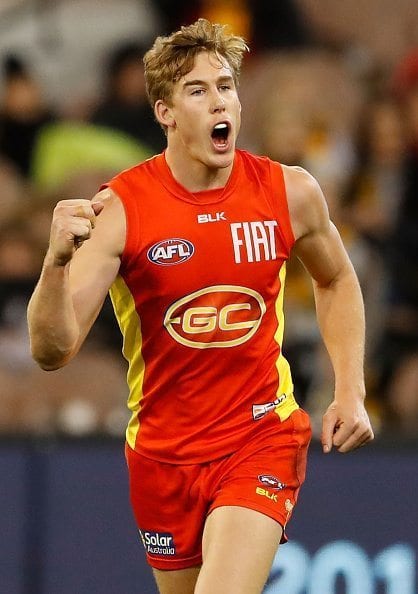 MELBOURNE, AUSTRALIA - JUNE 12: Tom Lynch of the Suns celebrates a goal during the 2016 AFL Round 12 match between the Richmond Tigers and the Gold Coast Suns at the Melbourne Cricket Ground on June 12, 2016 in Melbourne, Australia.