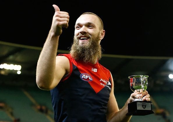 MELBOURNE, AUSTRALIA - JUNE 13: Neale Daniher Trophy winner Max Gawn of the Demons thanks fans during the 2016 AFL Round 12 match between the Melbourne Demons and the Collingwood Magpies at the Melbourne Cricket Ground on June 13, 2016 in Melbourne, Australia.