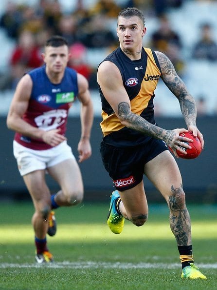 MELBOURNE, AUSTRALIA - JUNE 25: Dustin Martin of the Tigers in action during the 2016 AFL Round 14 match between the Richmond Tigers and the Brisbane Lions at the Melbourne Cricket Ground on June 25, 2016 in Melbourne, Australia. (Photo by Adam Trafford/AFL Media/Getty Images)