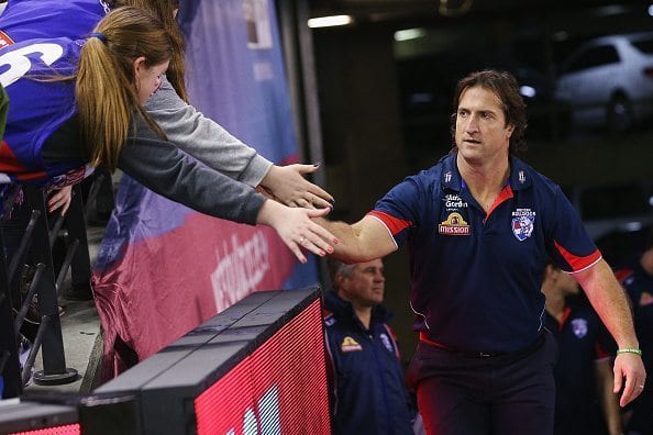 MELBOURNE, AUSTRALIA - AUGUST 08: Bulldogs head coach Luke Beveridge is greeted by fans during the round 19 AFL match between the Western Bulldogs and Port Adelaide Power at Etihad Stadium on August 8, 2015 in Melbourne, Australia. (Photo by Michael Dodge/Getty Images)
