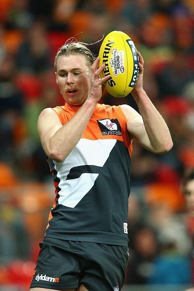 SYDNEY, AUSTRALIA - AUGUST 09: Cam McCarthy of the Giants marks during the round 19 AFL match between the Greater Western Sydney Giants and the Essendon Bombers at Spotless Stadium on August 9, 2015 in Sydney, Australia. (Photo by Cameron Spencer/Getty Images)