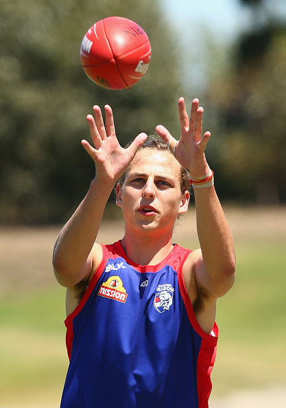 MELBOURNE, AUSTRALIA - DECEMBER 15: Luke Goetz of the Bulldogs marks during a Western Bulldogs AFL pre-season training session at Whitten Oval on December 15, 2015 in Melbourne, Australia. (Photo by Quinn Rooney/Getty Images)