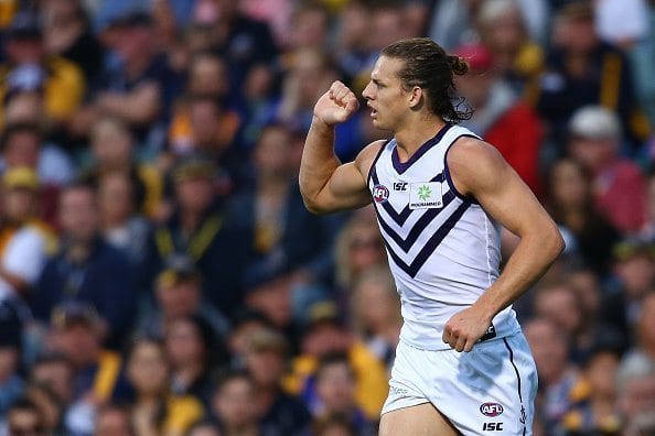 PERTH, WESTERN AUSTRALIA - APRIL 09:  Nathan Fyfe of the Dockers celebrates a goal during the round three AFL match between the West Coast Eagles and the Fremantle Dockers at Domain Stadium on April 9, 2016 in Perth, Australia.  (Photo by Paul Kane/Getty Images)