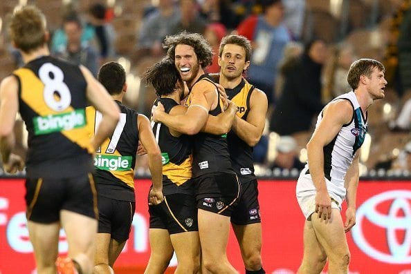 MELBOURNE, AUSTRALIA - APRIL 30: Tyrone Vickery of the Tigers celebrates after kicking a goal during the round six AFL match between the Richmond Tigers and the Port Adelaide Power at Melbourne Cricket Ground on April 30, 2016 in Melbourne, Australia. (Photo by Scott Barbour/Getty Images)