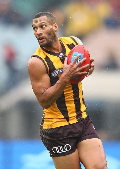 MELBOURNE, AUSTRALIA - JUNE 04:  Josh Gibson of the Hawks runs with the ball during the round 11 AFL match between the Hawthorn Hawks and Melbourne Demons at Melbourne Cricket Ground on June 4, 2016 in Melbourne, Australia.  (Photo by Scott Barbour/Getty Images)