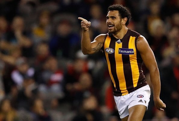MELBOURNE, AUSTRALIA - JUNE 10: Cyril Rioli of the Hawks celebrates a goal during the 2016 AFL Round 12 match between the Essendon Bombers and the Hawthorn Hawks at Etihad Stadium on June 10, 2016 in Melbourne, Australia. (Photo by Adam Trafford/AFL Media/Getty Images)