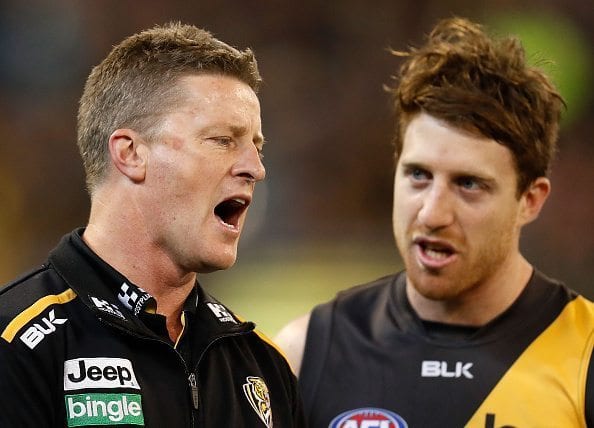 MELBOURNE, AUSTRALIA - JUNE 12: Damien Hardwick, Senior Coach of the Tigers speaks with during the 2016 AFL Round 12 match between the Richmond Tigers and the Gold Coast Suns at the Melbourne Cricket Ground on June 12, 2016 in Melbourne, Australia. (Photo by Michael Willson/AFL Media/Getty Images)