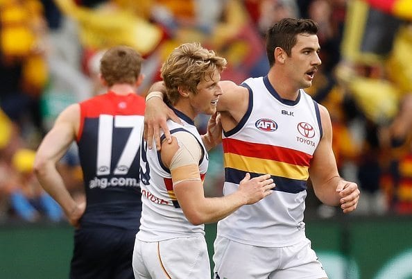 MELBOURNE, AUSTRALIA - JULY 03: Rory Sloane (left) and Taylor Walker of the Crows celebrate during the 2016 AFL Round 15 match between the Melbourne Demons and the Adelaide Crows at the Melbourne Cricket Ground on July 3, 2016 in Melbourne, Australia. (Photo by Michael Willson/AFL Media/Getty Images)