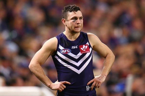 PERTH, AUSTRALIA - JULY 15: Hayden Ballantyne of the Dockers looks on from the interchange during the round 17 AFL match between the Fremantle Dockers and the Geelong Cats at Domain Stadium on July 15, 2016 in Perth, Australia. (Photo by Paul Kane/Getty Images)