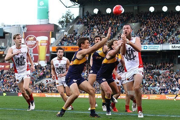 PERTH, AUSTRALIA - JULY 23: Max Gawn of the Demons handballs during the round 18 AFL match between the West Coast Eagles and the Melbourne Demons at Domain Stadium on July 23, 2016 in Perth, Australia. (Photo by Paul Kane/Getty Images)