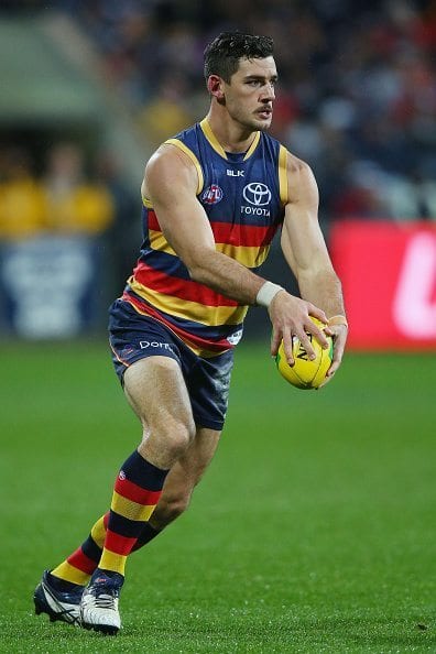 GEELONG, AUSTRALIA - JULY 23: Taylor Walker of the Crows looks upfield during the round 18 AFL match between the Geelong Cats and the Adelaide Crows at Simonds Stadium on July 23, 2016 in Geelong, Australia. (Photo by Michael Dodge/Getty Images)