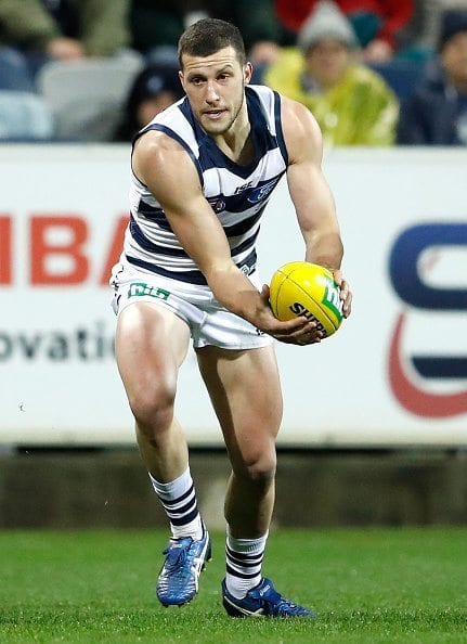 GEELONG, AUSTRALIA - JULY 23: Debutante, Sam Menegola of the Cats in action during the 2016 AFL Round 18 match between the Geelong Cats and the Adelaide Crows at Simonds Stadium on July 23, 2016 in Geelong, Australia. (Photo by Adam Trafford/AFL Media/Getty Images)