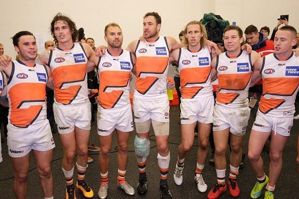 ADELAIDE, AUSTRALIA - JULY 24: GWS Giants players sing the team song after the round 18 AFL match between the Port Adelaide Power and the Greater Western Sydney Giants at Adelaide Oval on July 24, 2016 in Adelaide, Australia. (Photo by Darrian Traynor/Getty Images)