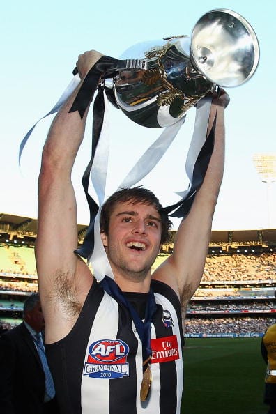 MELBOURNE, AUSTRALIA - OCTOBER 02:  Alan Toovey of the Magpies celebrates with the Premiership Cup after the Magpies won the AFL Grand Final Replay match between the Collingwood Magpies and the St Kilda Saints at Melbourne Cricket Ground on October 2, 2010 in Melbourne, Australia.  (Photo by Quinn Rooney/Getty Images)