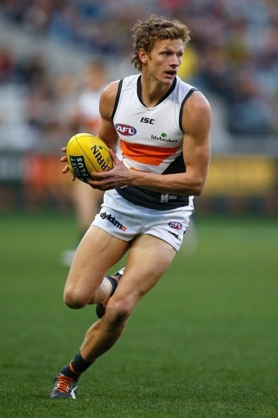 MELBOURNE, AUSTRALIA - AUGUST 02:  Will Hoskin-Elliott of the Giants runs with the ball during the round 19 AFL match between the Richmond Tigers and the Greater Western Sydney Giants at Melbourne Cricket Ground on August 2, 2014 in Melbourne, Australia.  (Photo by Darrian Traynor/Getty Images)
