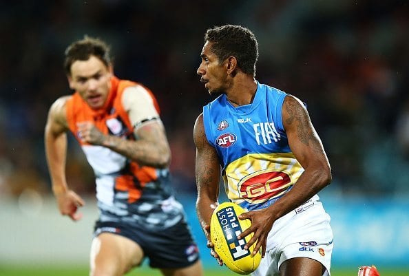 CANBERRA, AUSTRALIA - APRIL 25: Jarrod Garlett of the Suns in action during the round four AFL match between the Greater Western Sydney Giants and the Gold Coast Suns at StarTrack Oval on April 25, 2015 in Canberra, Australia.  (Photo by Mark Nolan/Getty Images)