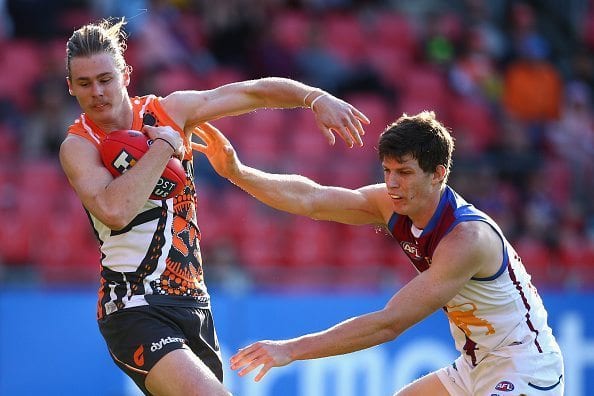 SYDNEY, AUSTRALIA - JUNE 07: Cam McCarthy of the Giants marks the ball during the round 10 AFL match between the Greater Western Sydney Giants and the Brisbane Lions at Spotless Stadium on June 7, 2015 in Sydney, Australia. (Photo by Cameron Spencer/Getty Images)