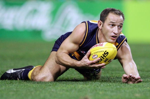 PERTH, AUSTRALIA - JULY 16: Phil Matera of the Eagles in action during the round 16 AFL match between the West Coast Eagles and the Brisbane Lions at Subiaco Oval on July 16, 2005 in Perth, Australia. (Photo by Paul Kane/Getty Images)