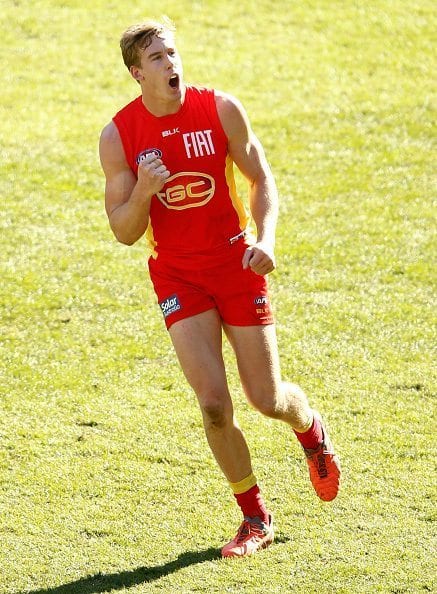 MELBOURNE, AUSTRALIA - JULY 31: Tom Lynch of the Suns celebrates a goal during the 2016 AFL Round 19 match between the Melbourne Demons and the Gold Coast Suns at the Melbourne Cricket Ground on July 31, 2016 in Melbourne, Australia. (Photo by Adam Trafford/AFL Media/Getty Images)