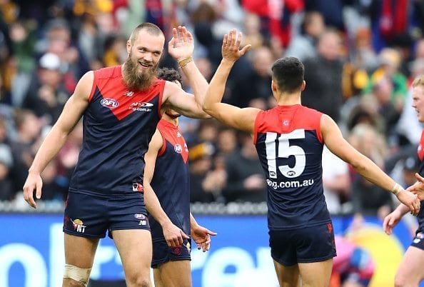 MELBOURNE, AUSTRALIA - AUGUST 06: Max Gawn of the Demons celebrates after kicking a goal with Billy Stretch of the Demons during the round 20 AFL match between the Melbourne Demons and the Hawthorn Hawks at Melbourne Cricket Ground on August 6, 2016 in Melbourne, Australia. (Photo by Scott Barbour/Getty Images)