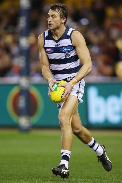 MELBOURNE, AUSTRALIA - AUGUST 07: Corey Enright of the Cats looks upfield during the round 20 AFL match between the Geelong Cats and the Essendon Bombers at Etihad Stadium on August 7, 2016 in Melbourne, Australia. (Photo by Michael Dodge/Getty Images)