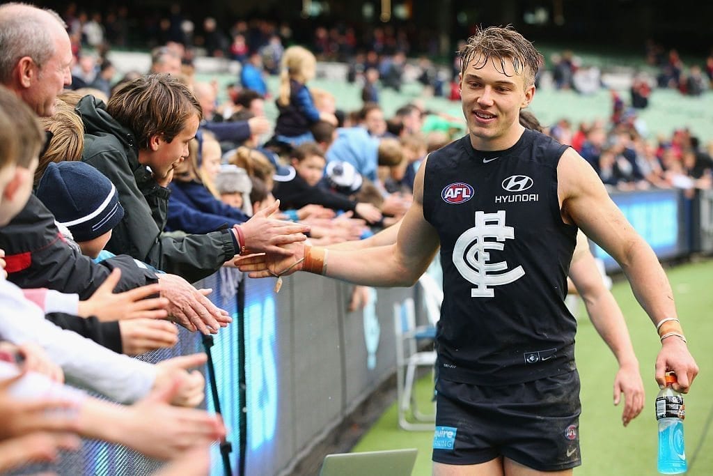 MELBOURNE, AUSTRALIA - AUGUST 21:  Patrick Cripps of the Blues celebrates the win with fans during the round 22 AFL match between the Carlton Blues and the Melbourne Demons at Melbourne Cricket Ground on August 21, 2016 in Melbourne, Australia.  (Photo by Michael Dodge/Getty Images)
