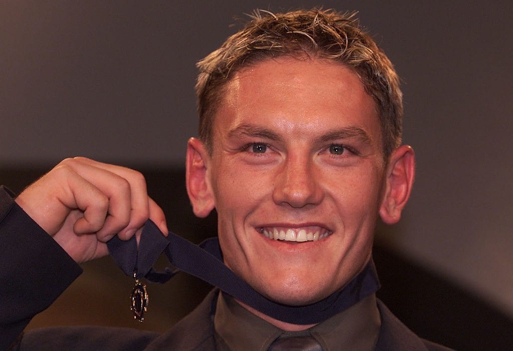 28 Aug 2000: Shane Woewodin of Melbourne with the medal after winning the 2000 Brownlow Medal Presentation, for the Best and Fairest AFL player, held at Crown Casino in Melbourne, Australia. DIGITAL IMAGE. Woewodin won the medal with 22 votes. Mandatory Credit: Hamish Blair/ALLSPORT