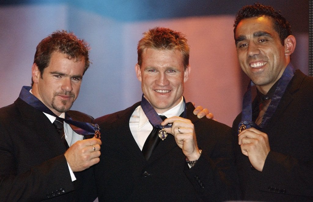 MELBOURNE, AUSTRALIA - SEPTEMBER 22: Mark Riccuito, Nathan Buckley and Adam Goodes with their Brownlow Medals during the AFL Brownlow Medal Count held at Crown Casino on September 22, 2003 in Melbourne, Australia. (Photo by Ryan Pierse/Getty Images)