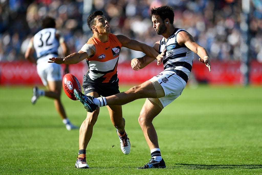 CANBERRA, AUSTRALIAN CAPITAL TERRITORY - APRIL 03:  Jimmy Bartel of the Cats kicks the ball during the round two AFL match between the Greater Western Sydney Giants and the Geelong Cats at Star Track Oval on April 3, 2016 in Canberra, Australia.  (Photo by Brett Hemmings/AFL Media/Getty Images)