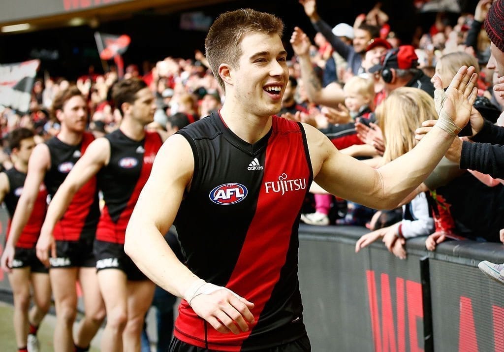 MELBOURNE, AUSTRALIA - AUGUST 14: Acting captain Zach Merrett of the Bombers thanks fans during the 2016 AFL Round 21 match between the Essendon Bombers and the Gold Coast Suns at Etihad Stadium on August 14, 2016 in Melbourne, Australia. (Photo by Adam Trafford/AFL Media/Getty Images)