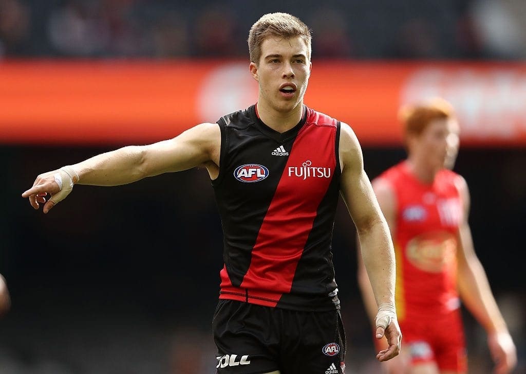 MELBOURNE, AUSTRALIA - AUGUST 14: Zach Merrett of the Bombers directs his teammates during the round 21 AFL match between the Essendon Bombers and the Gold Coast Suns at Etihad Stadium on August 14, 2016 in Melbourne, Australia. (Photo by Scott Barbour/Getty Images)