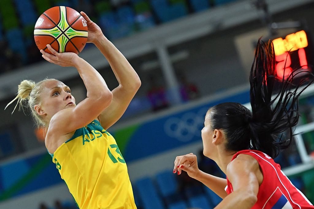 Australia's shooting guard Erin Phillips (L) takes a shot over Serbia's forward Sonja Petrovic during a Women's quarterfinal basketball match between Australia and Serbia at the Carioca Arena 1 in Rio de Janeiro on August 16, 2016 during the Rio 2016 Olympic Games. / AFP / Andrej ISAKOVIC (Photo credit should read ANDREJ ISAKOVIC/AFP/Getty Images)
