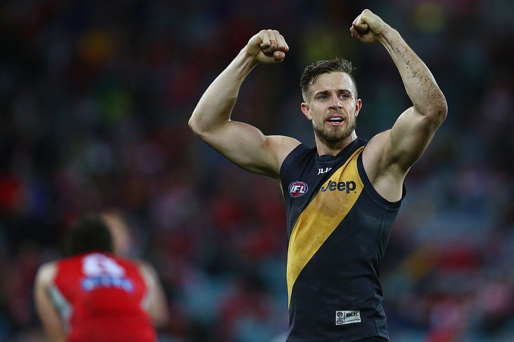 SYDNEY, AUSTRALIA - AUGUST 30: Brett Deledio of the Tigers celebrates victory during the round 23 AFL match between the Sydney Swans and the Richmond Tigers at ANZ Stadium on August 30, 2014 in Sydney, Australia. (Photo by Mark Kolbe/Getty Images)