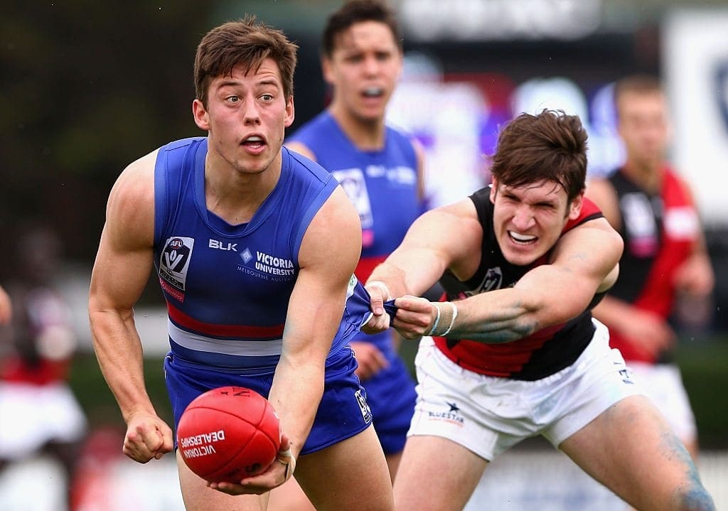 MELBOURNE, AUSTRALIA - SEPTEMBER 12: Nathan Hrovat of Footscray handballs during the VFL Semi Final match between the Footscray Bulldogs and the Essendon Bombers on September 12, 2015 in Melbourne, Australia. (Photo by Robert Prezioso/AFL Media/Getty Images)