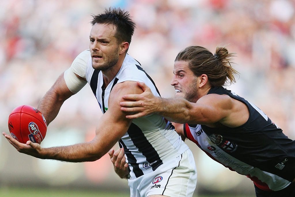 MELBOURNE, AUSTRALIA - APRIL 09: Josh Bruce of the Saints tackles Nathan Brown of the Magpies during the round three AFL match between the St Kilda Saints and the Collingwood Magpies at Melbourne Cricket Ground on April 9, 2016 in Melbourne, Australia. (Photo by Michael Dodge/Getty Images)