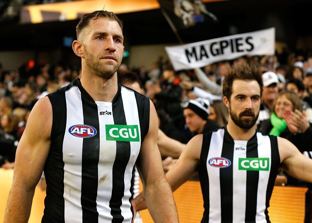 MELBOURNE, AUSTRALIA - AUGUST 28: Travis Cloke of the Magpies leaves the field after the match during the 2016 AFL Round 23 match between the Hawthorn Hawks and the Collingwood Magpies at the Melbourne Cricket Ground on August 28, 2016 in Melbourne, Australia. (Photo by Adam Trafford/AFL Media/Getty Images)