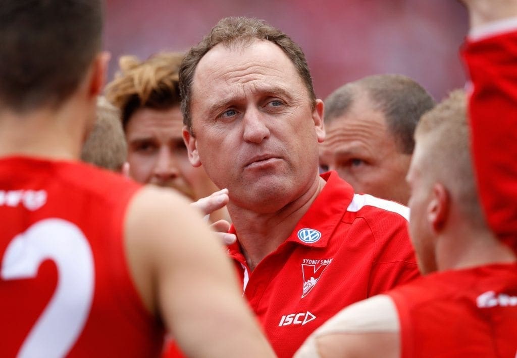 MELBOURNE, AUSTRALIA - OCTOBER 01: John Longmire, Senior Coach of the Swans addresses his players during the 2016 Toyota AFL Grand Final match between the Sydney Swans and the Western Bulldogs at the Melbourne Cricket Ground on October 01, 2016 in Melbourne, Australia. (Photo by Adam Trafford/AFL Media/Getty Images)